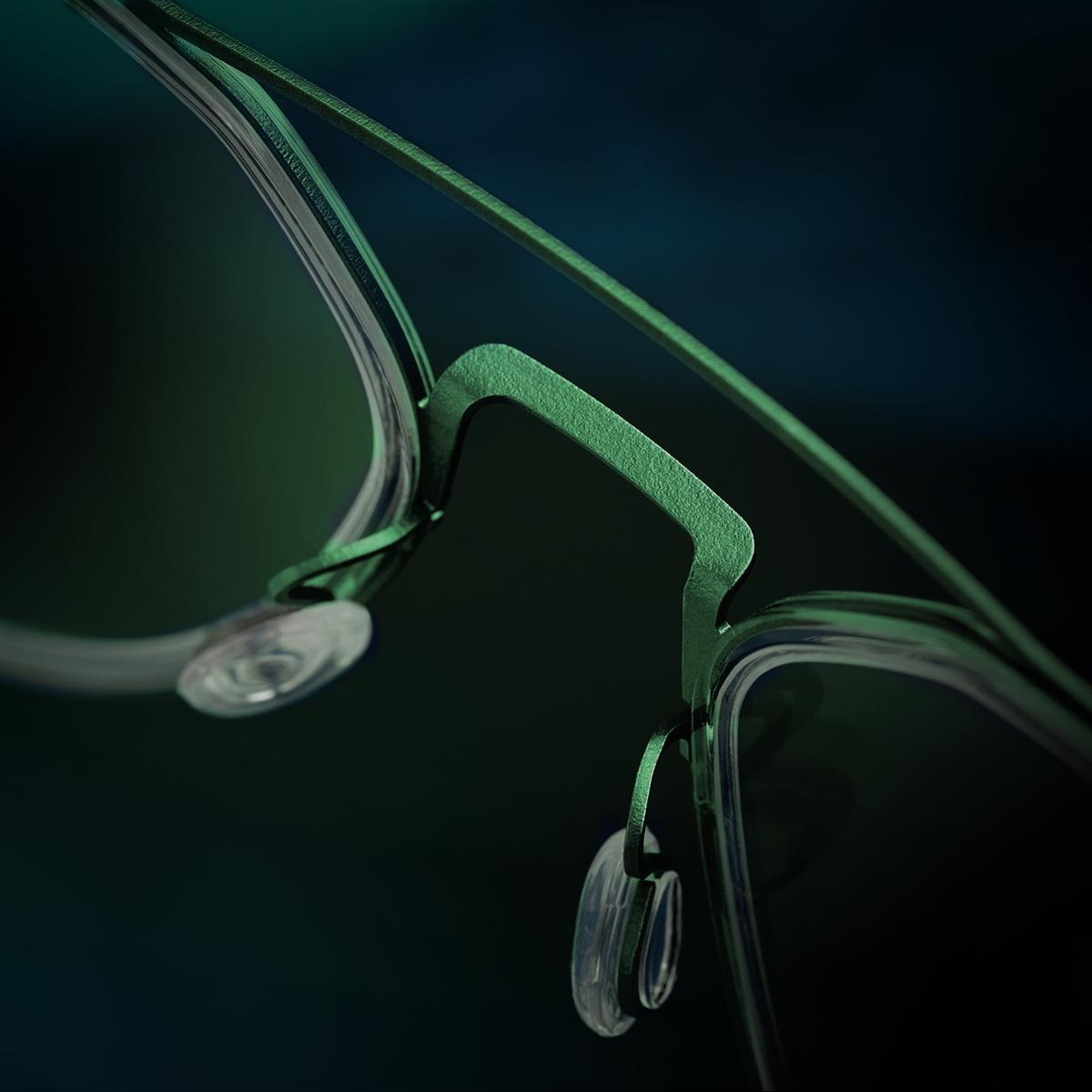 Detail of LINDBERG strip titanium 9745 117 titanium nose bridge of aviator shape glasses in green colour